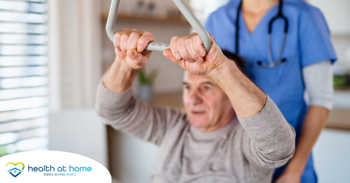 A senior exercises and improves his strength through physical therapy in his own home.